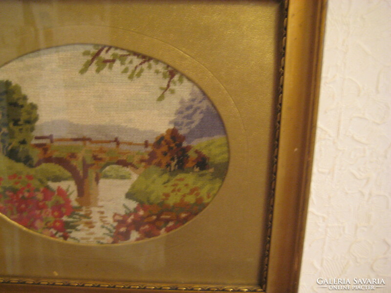 Old needle tapestry in a nice frame, with an oval golden passepartout 29 x 24 cm