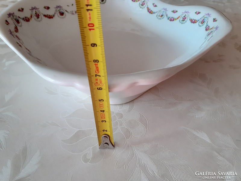 Old square rose-patterned porcelain bowl with flower garland and rose garnish