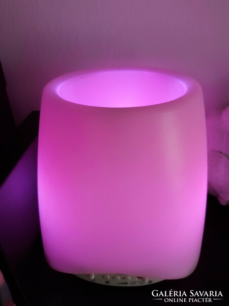 Muse brand electric color-changing mood light with built-in speaker and flower holder function
