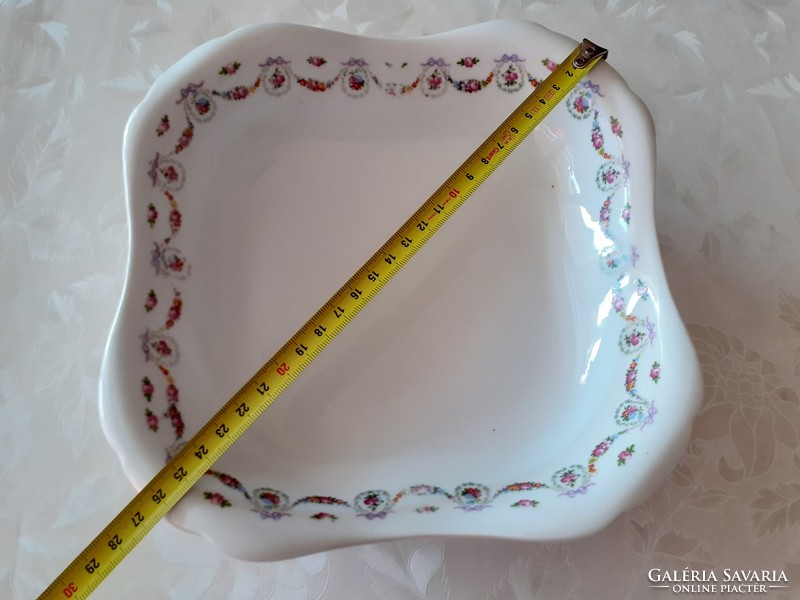 Old square rose-patterned porcelain bowl with flower garland and rose garnish