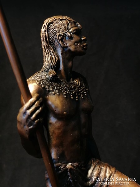 Bronze statue of Maasai lion killer hunter
