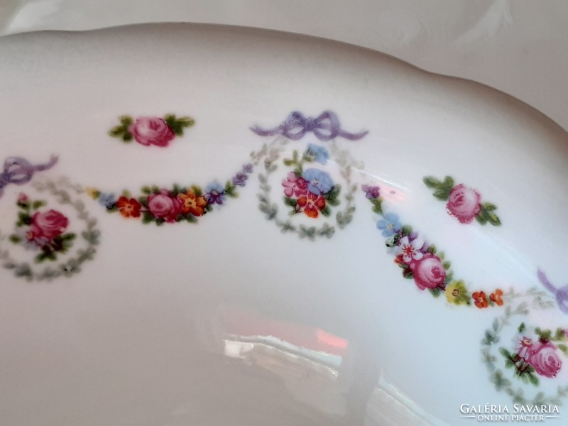 Old square rose-patterned porcelain bowl with flower garland and rose garnish