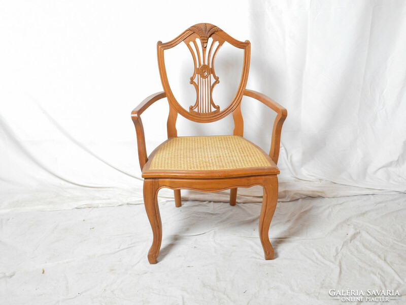 Chair with reed arms