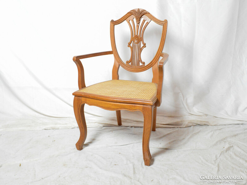 Chair with reed arms
