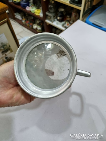 Old aluminum cup