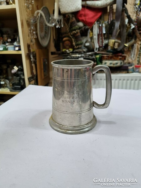 Old aluminum cup