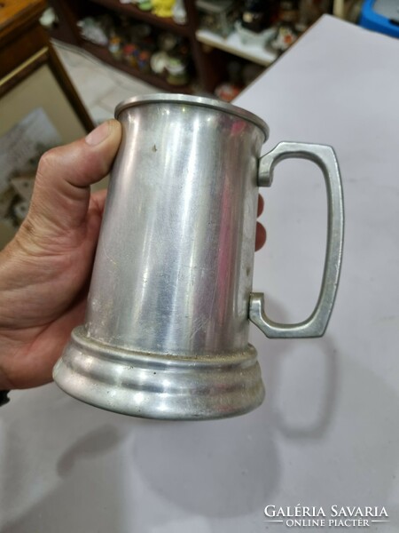 Old aluminum cup