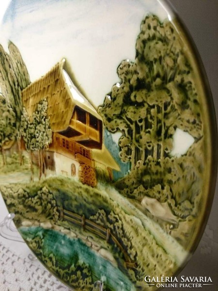Majolica wall plate depicting a particularly beautiful alpine house in V & b type 2556.