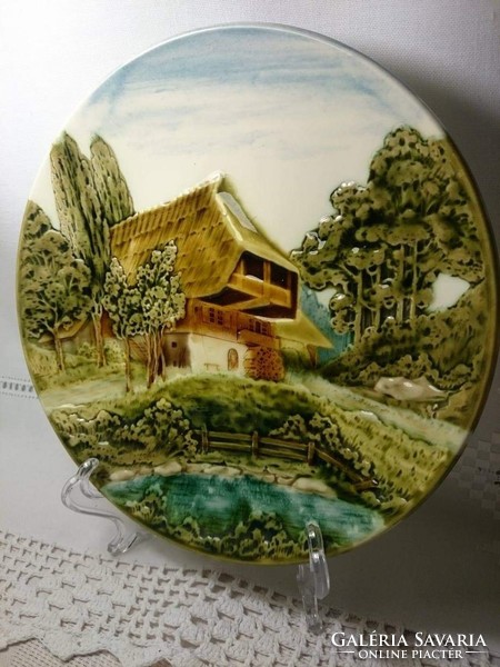 Majolica wall plate depicting a particularly beautiful alpine house in V & b type 2556.