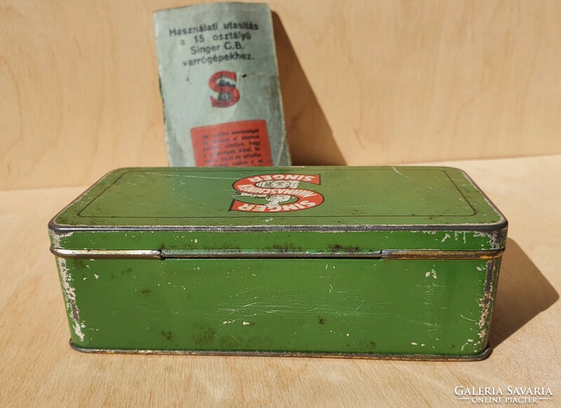 Antique singer metal box sewing box with instructions for use with a small booklet