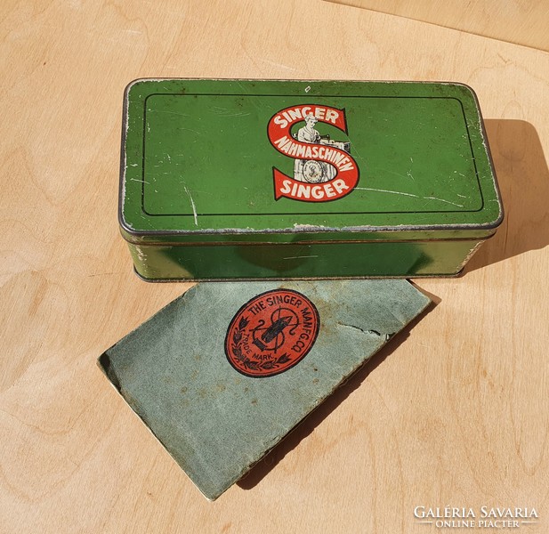 Antique singer metal box sewing box with instructions for use with a small booklet