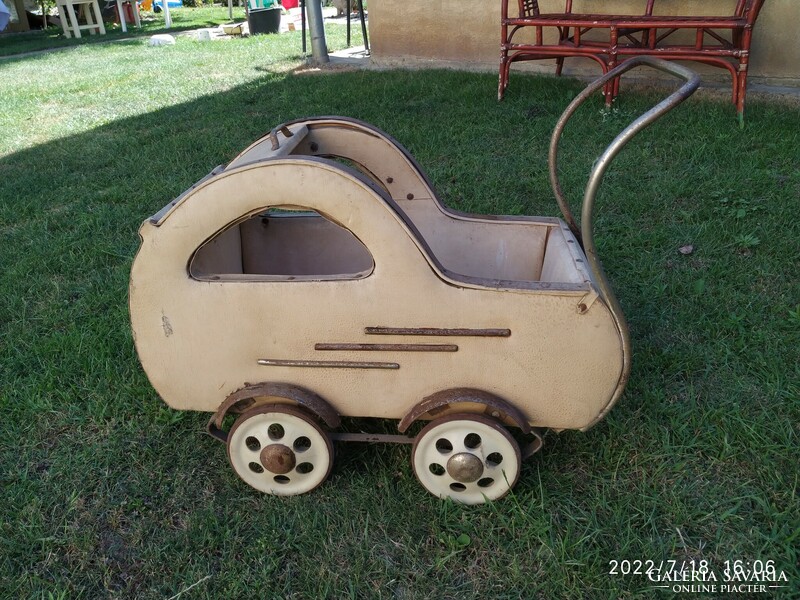 Retro stroller with blinds from the 50s for sale.