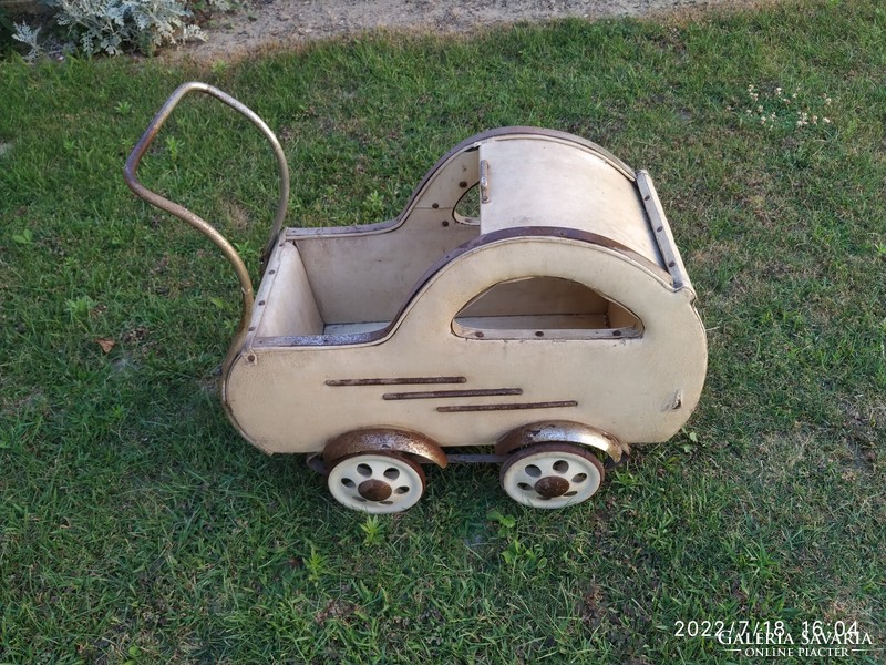 Retro stroller with blinds from the 50s for sale.