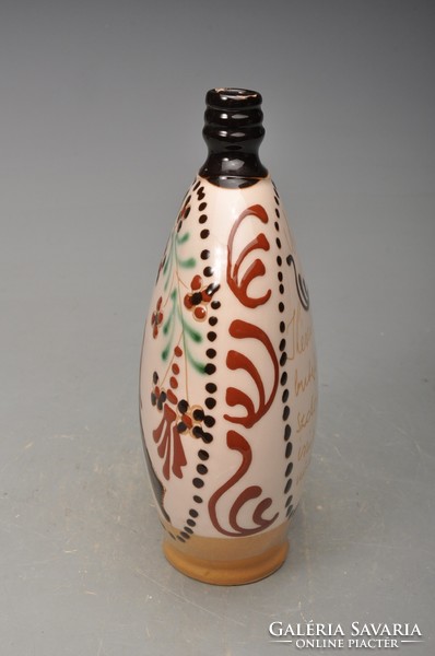 Bottle painted with bird field inscription. With a poem.