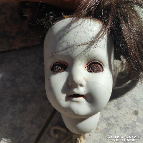 Antique porcelain biscuit head doll, head marked.