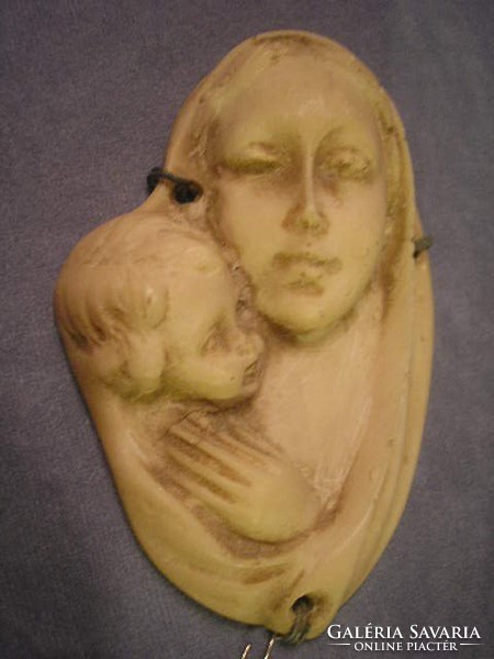 Mária, with your little one, you are Asian from an antique precious bone. African carving rarity can be given as a gift