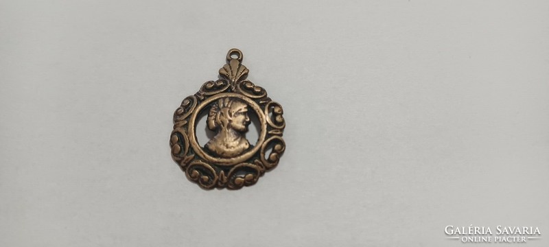 Antique copper or bronze pendant