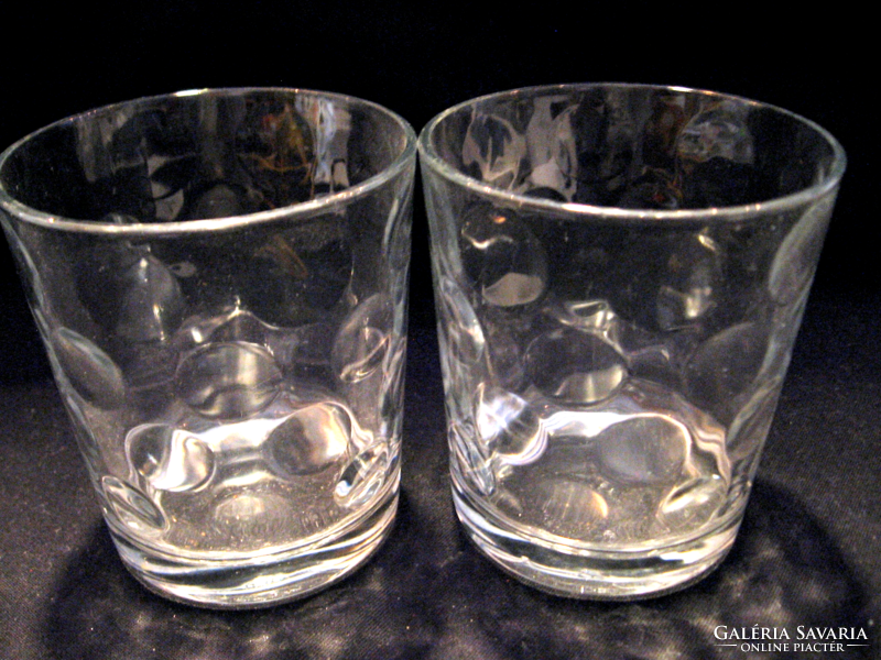 A pair of polka dot candle holders