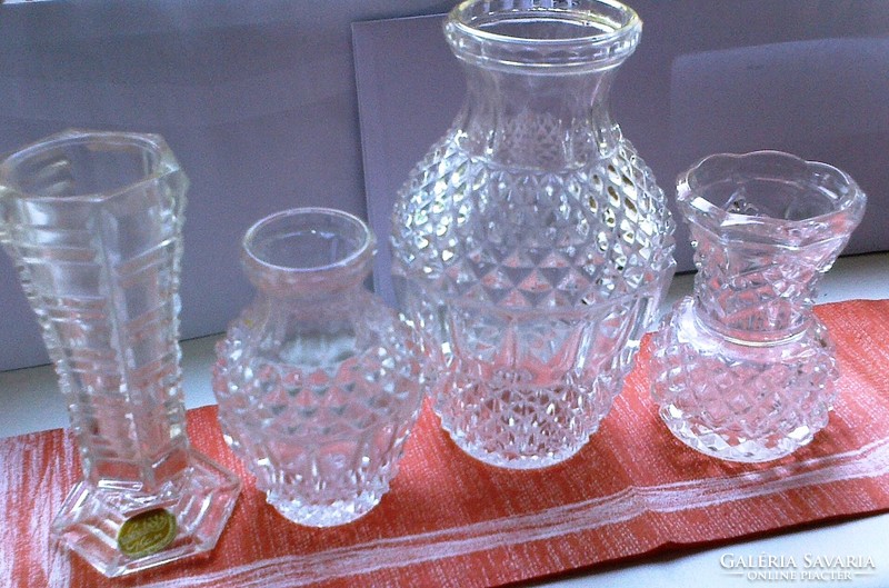 I am selling small old glass vases