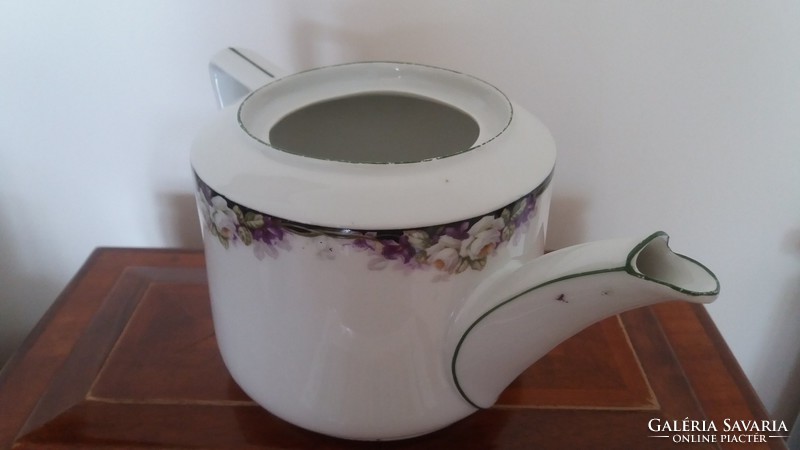 Old porcelain tea pot with rose pattern vintage spout