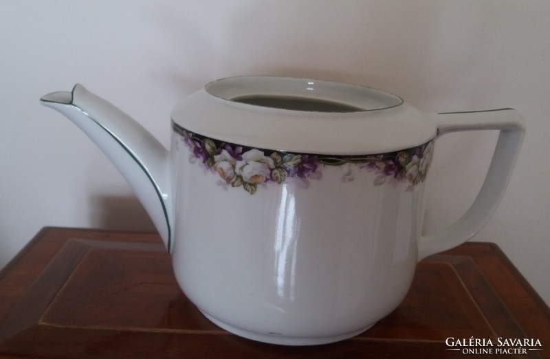 Old porcelain tea pot with rose pattern vintage spout