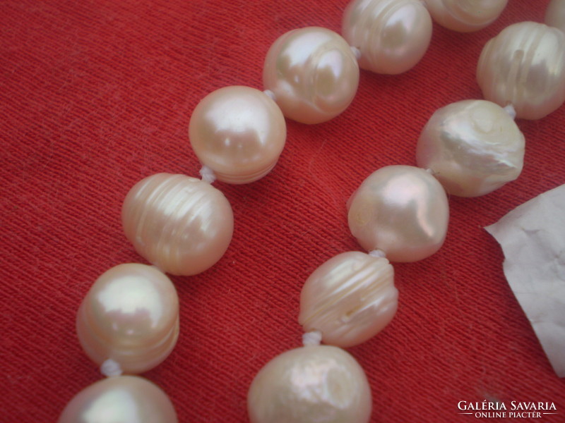 Cultured pearl necklaces .2.. With chain extension