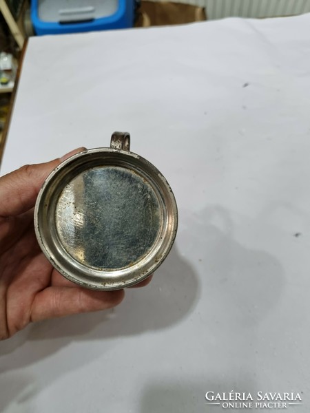Old metal cup holder