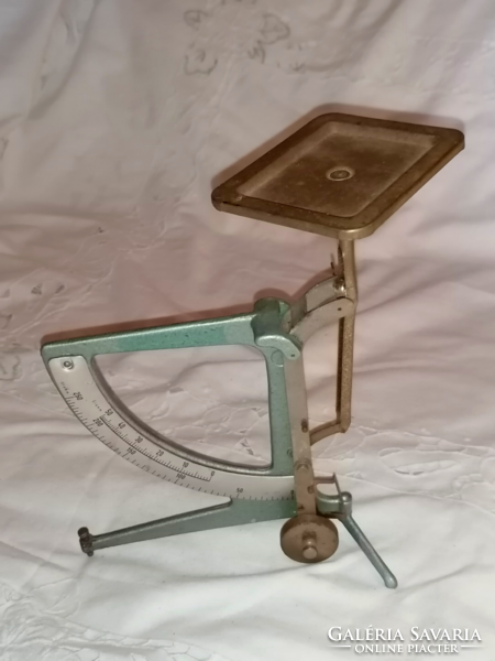 Old metal postal scale