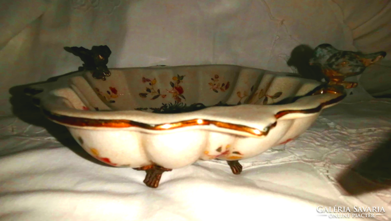 An attractive copper bowl with rataté bird decoration, with a beautiful pattern