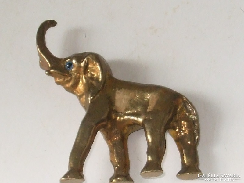 Old solid copper elephant.