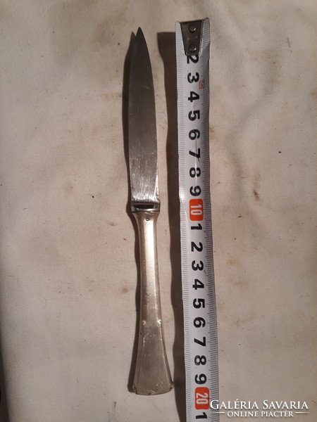 Knife with silver handle