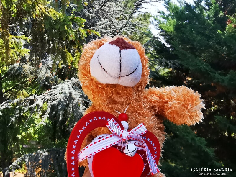 Plush bear with heart