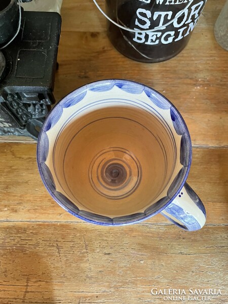 Handmade folk ceramic mug with blue dots