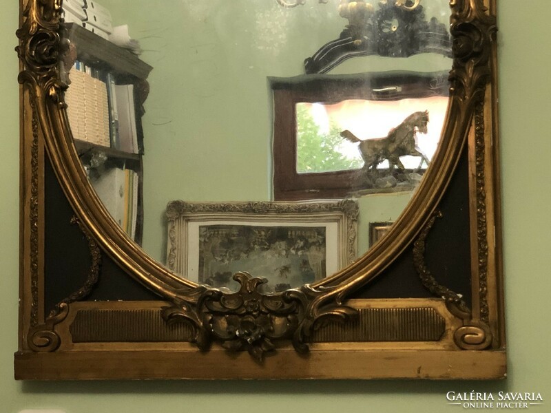 Antique gilded mirror.