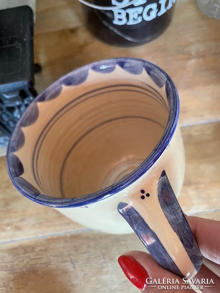 Handmade folk ceramic mug with blue dots