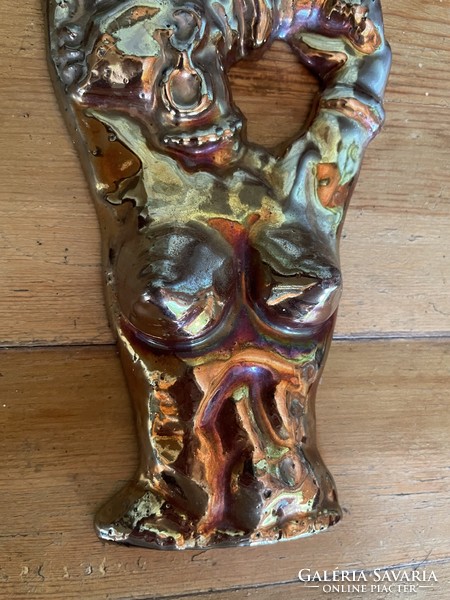 Old eosin glazed cast iron wall decoration, African woman figure