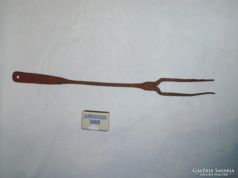 Antique wrought iron meat fork