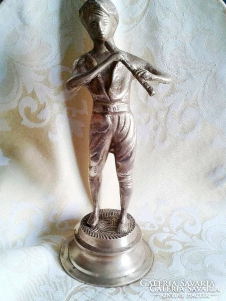 Large bronze v. Copper flutist boy sculpture very wide