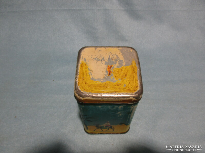 Old coffee metal box with a camel pattern, spice holder, storage