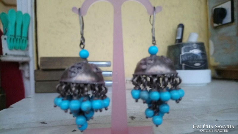 Vintage sterling silver pair of logo earrings decorated with turquoise stones