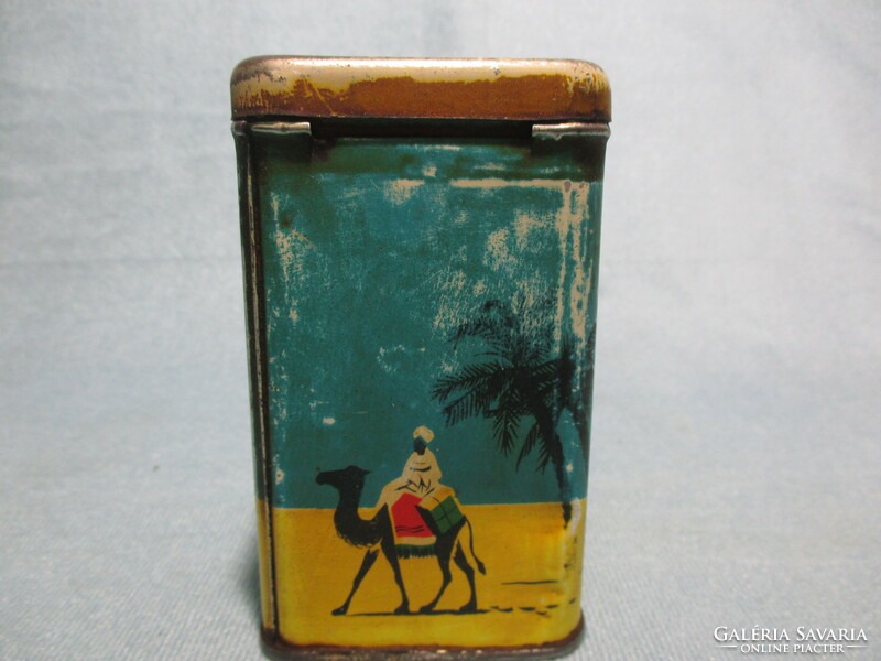 Old coffee metal box with a camel pattern, spice holder, storage