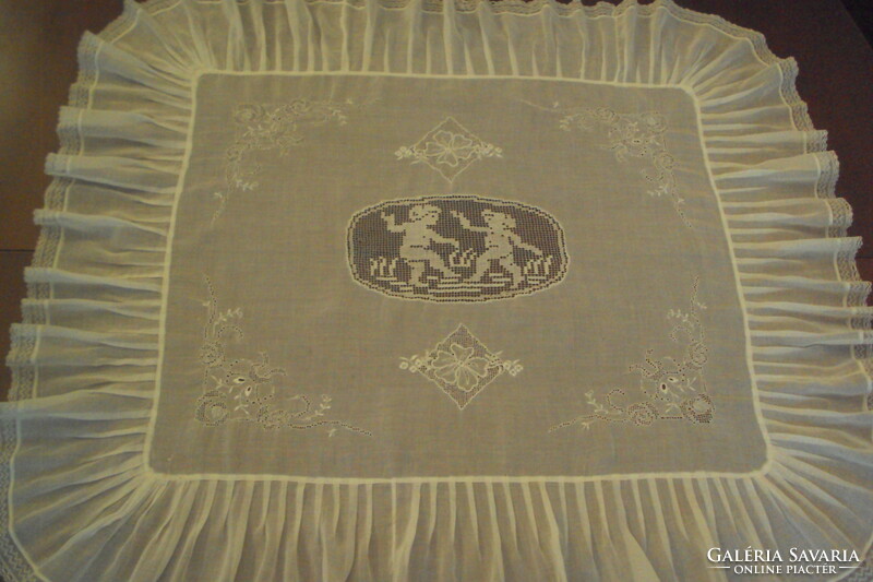 Breathtakingly delicate antique tablecloth made of organdy, with azure corner decorations, netted lace medallion in the middle.