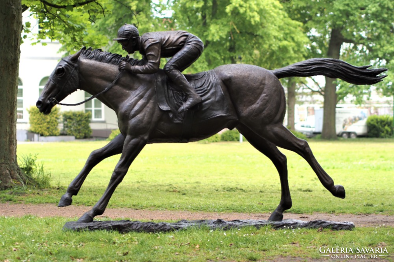 Jockey on a horse - life-size bronze statue