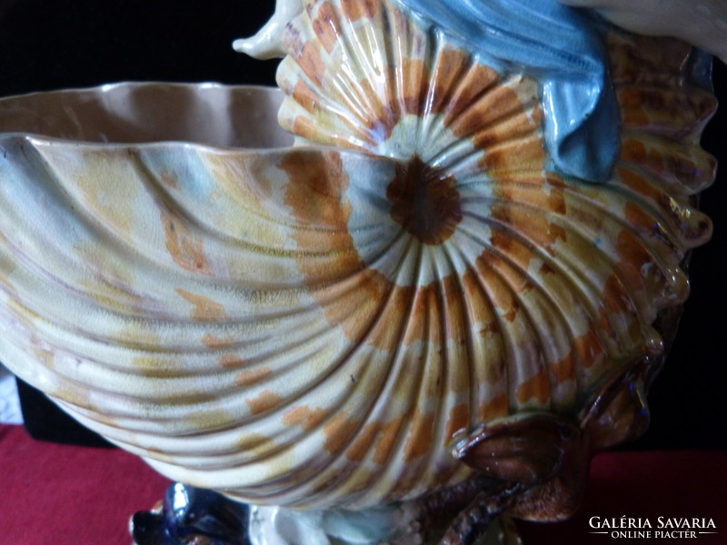 45 Cm. Majolica / putto, shells, dolphins.