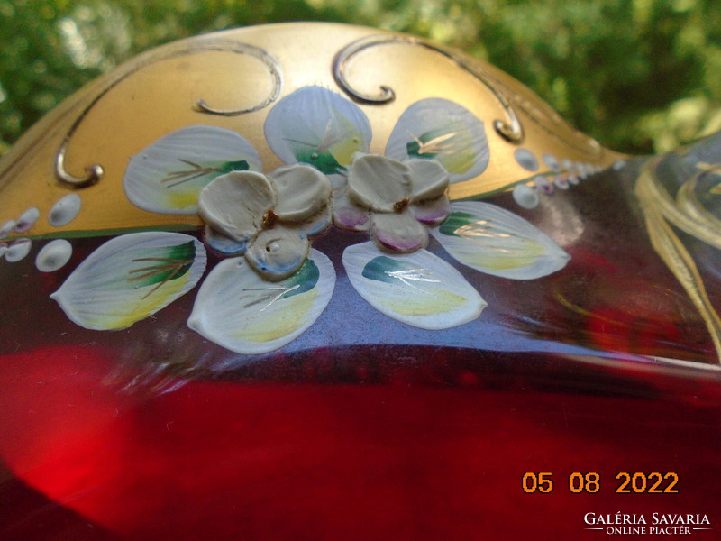 A glass stand decorated with 24K embossed gold and colorful embossed enamel flowers is a spectacular offer