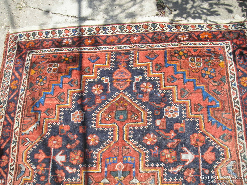 Antique, worn carpet 120x210