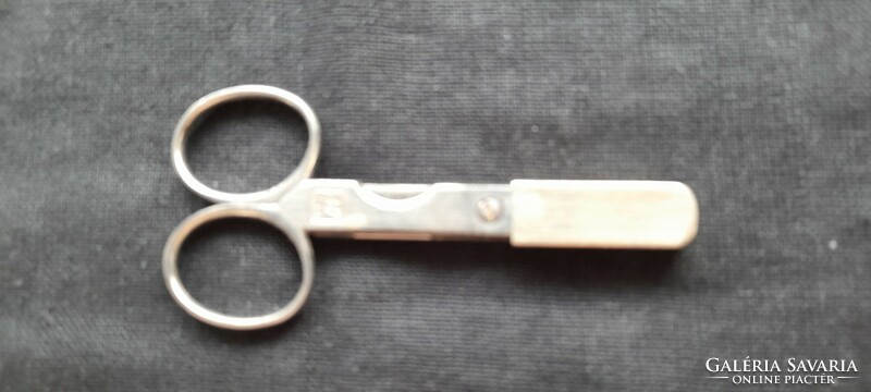 Vintage cigar pocket scissors, nickel-plated, with sleeve end.