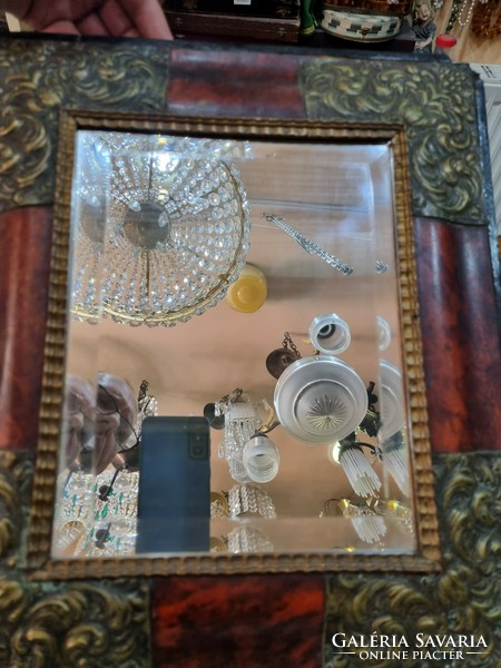 Old mirror in a gilded frame