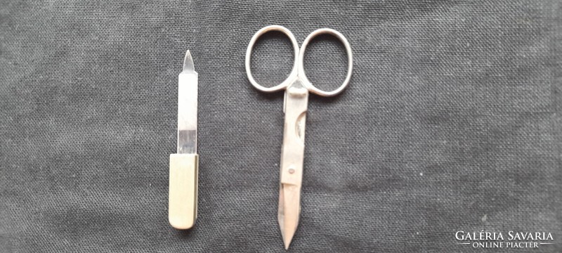 Vintage cigar pocket scissors, nickel-plated, with sleeve end.