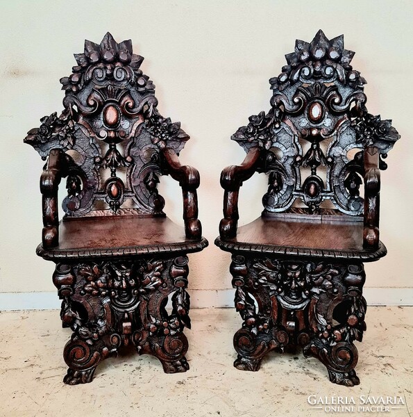 A557 antique, renaissance-style sgabello chairs with richly carved arms